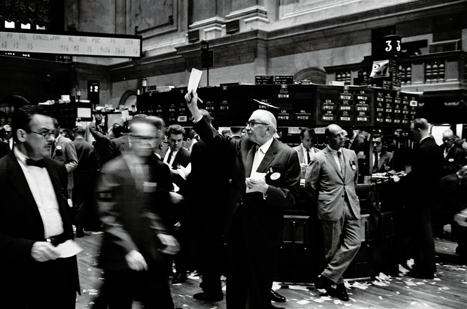 Old time image of brokers on the NYSE trading floor