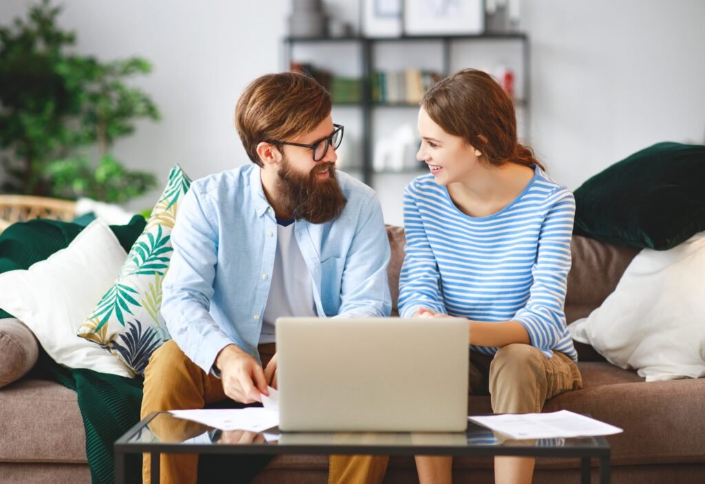 Married couple talking about merging finances