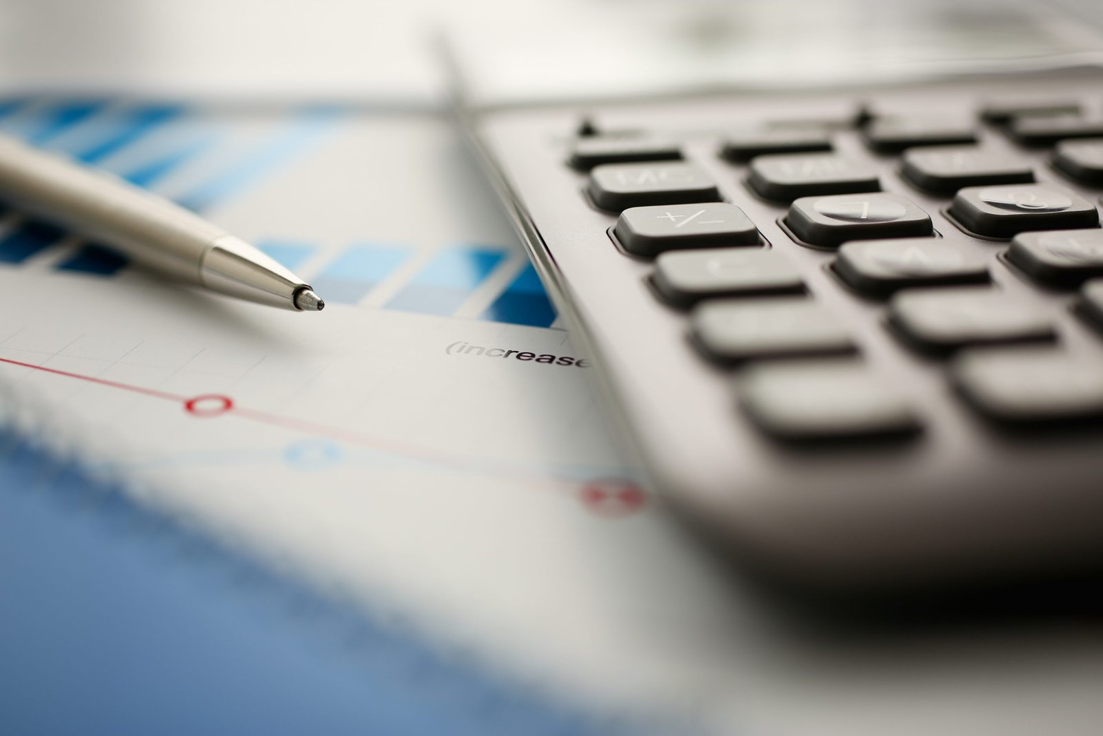 Silver calculator and financial statistics on clipboard - Thor Wealth Managment, Inc. compounding interest