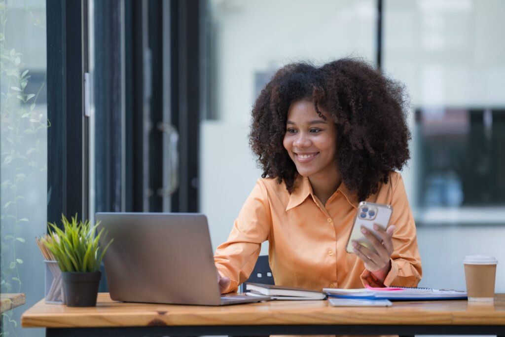 Portrait of a beautiful confident businesswoman using a laptop c - Thor Wealth Managment, Inc. Options for Old Retirement Plans