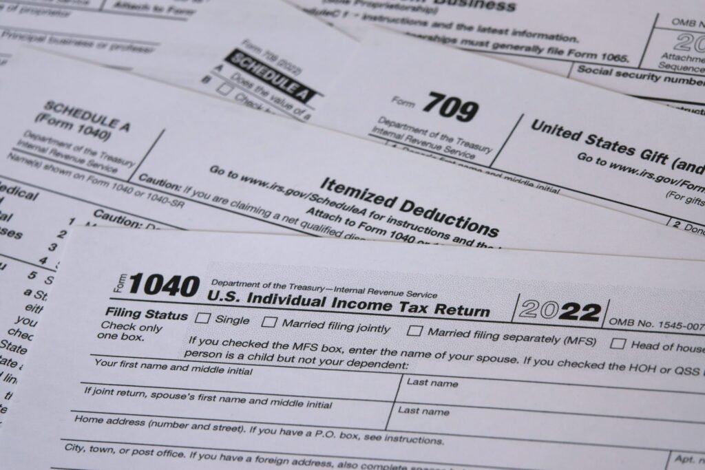 In 2023, a a tax year 2022 IRS 1040 tax form is shown, along with Itemized Deductions (Schedule A) and Gift (form 709) worksheets. The Internal Revenue Service tax filing deadline in 2023 is April 18. - Thor Wealth Managment, Inc. tax planning