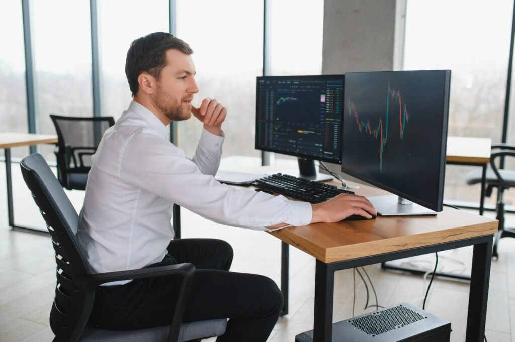 Serious business man trader analyst looking at computer monitor, investor broker analyzing indexes, financial chart trading online investment data on cryptocurrency stock market graph on pc screen. - Thor Wealth Managment, Inc. investor rules