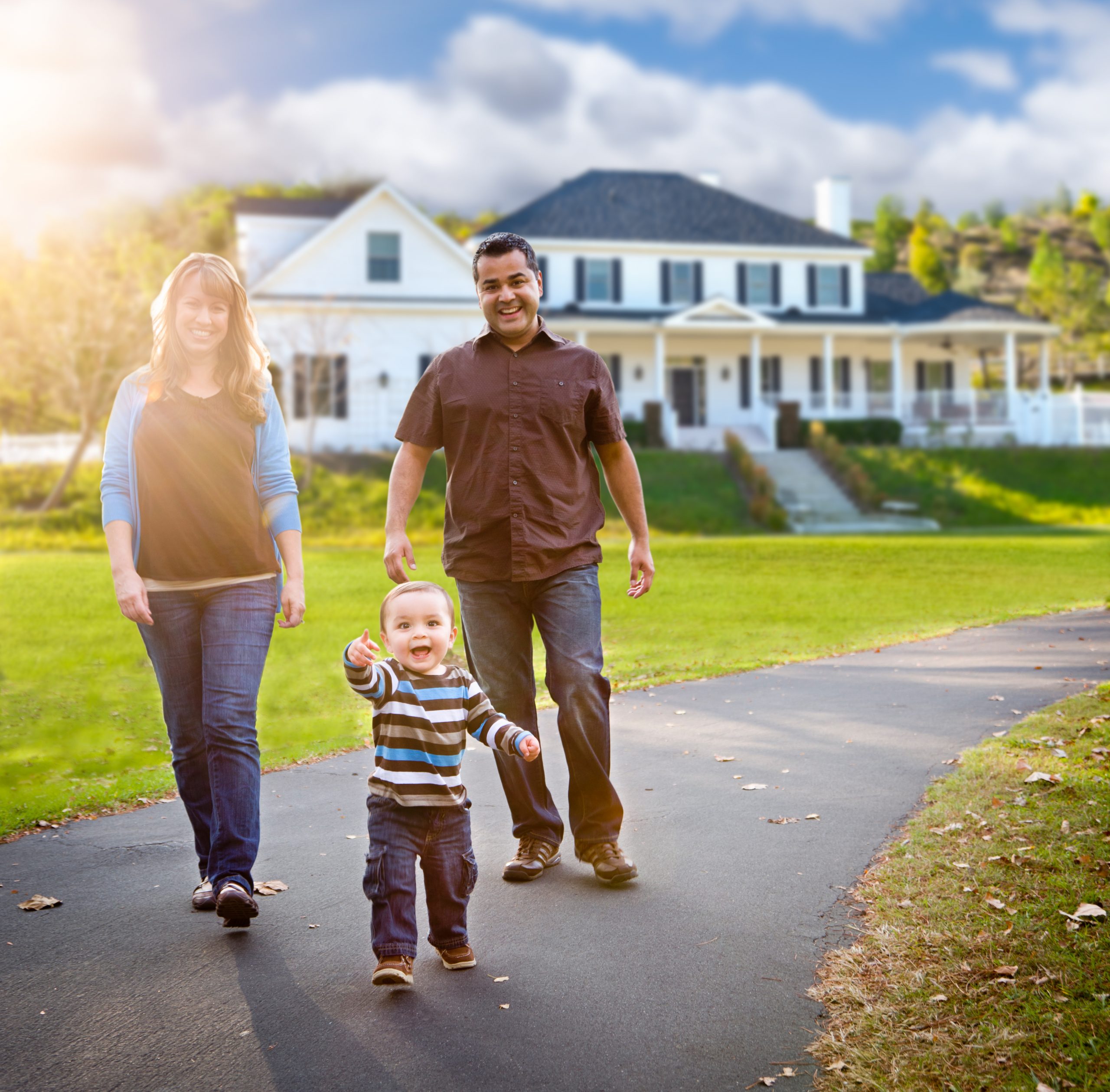 Young family outside their new home whom are stratified with their retirement plan.