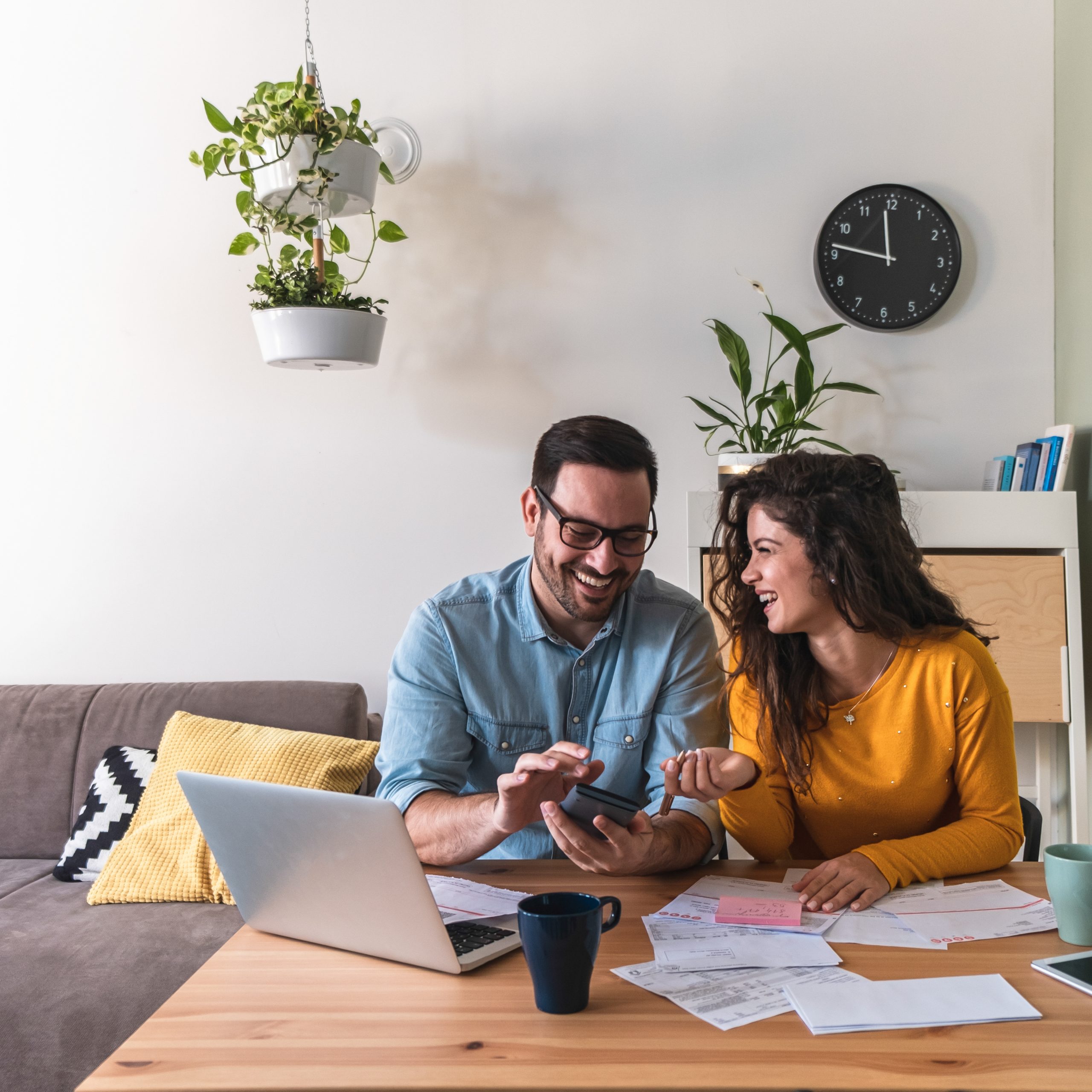 Young couple working on their budget for retirement.